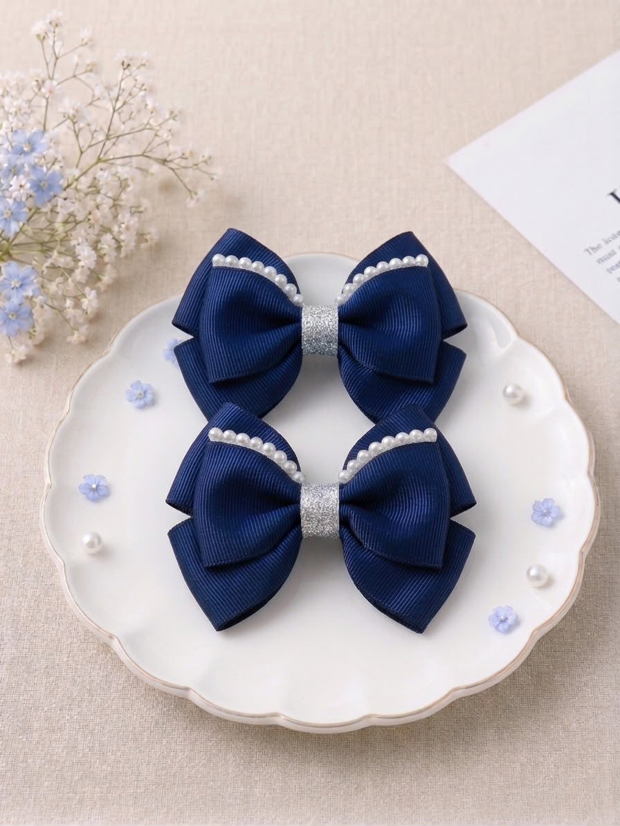 NAVY PEARL BOW CLIP SET